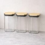 סט 3 צנצנות מרבועות זכוכית אפורה מכסה זהב 1.5 ל׳